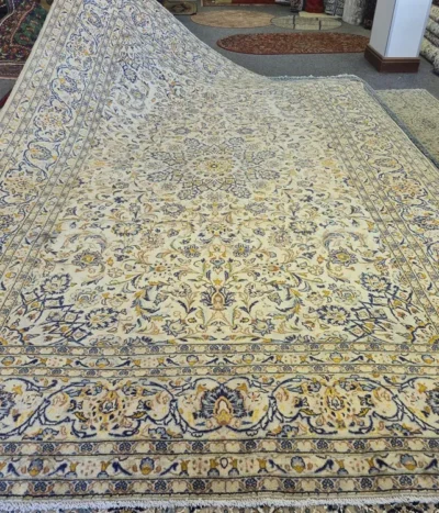 Fine handmade Mashad rug, Size: 370 x 245 cm, A rare, luminous ivory field accented by deep indigo blues and golden-ochre details. Premium wool on a sturdy cotton foundation for a soft feel and lifelong wear.