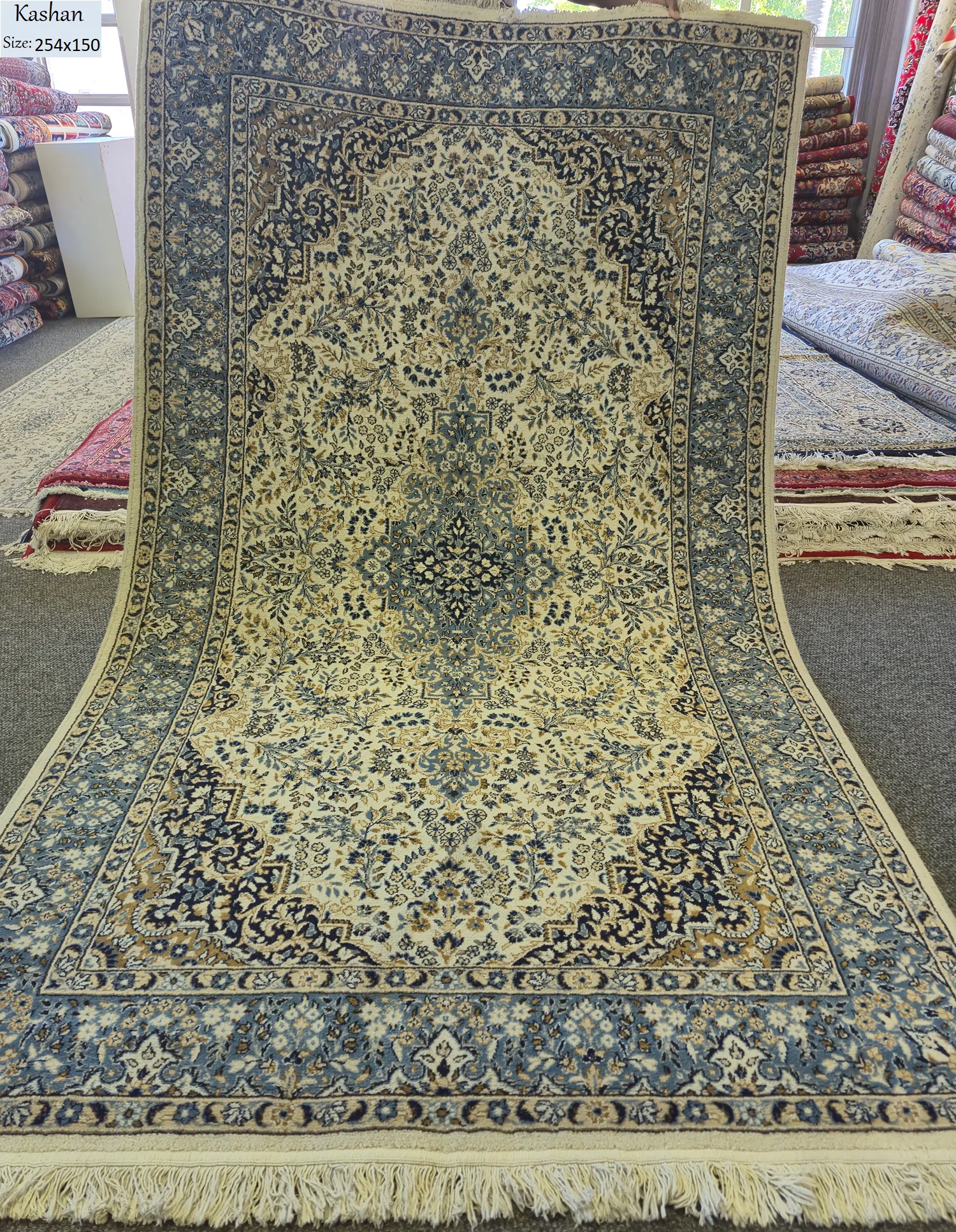 Persian floral Kashan, Size: 254x150 cm, 400 knots wool on cotton quality, R10 000 valuation.