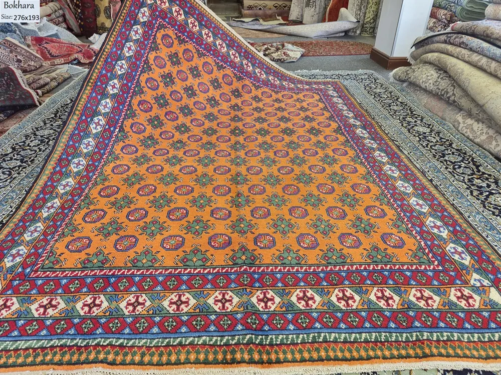 Golden Orange Hand-Knotted Afghan Bokhara, Size: 276 x 193 cm, Repeating Tekke Gul (medallion) pattern, High-quality wool on a durable cotton foundation.