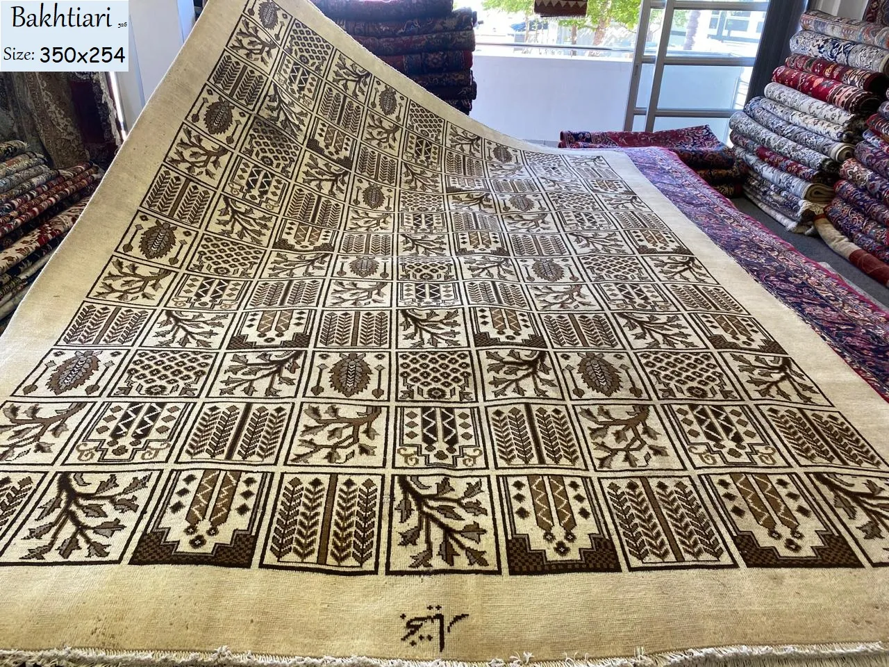 Fine handmade Bakhtiari carpet, Size: 350 x 254 cm, hand knotted artist signature by natural wool & vegetable dye. R30 000 valuation certificate & exchange warranty.
