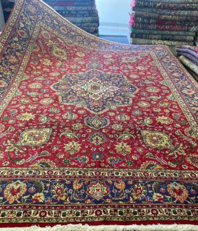 Handmade Tabriz rug, Size: 387 x 300 cm, fine knotted by natural wool & vegetable dye, R24 000 valuation certificate.