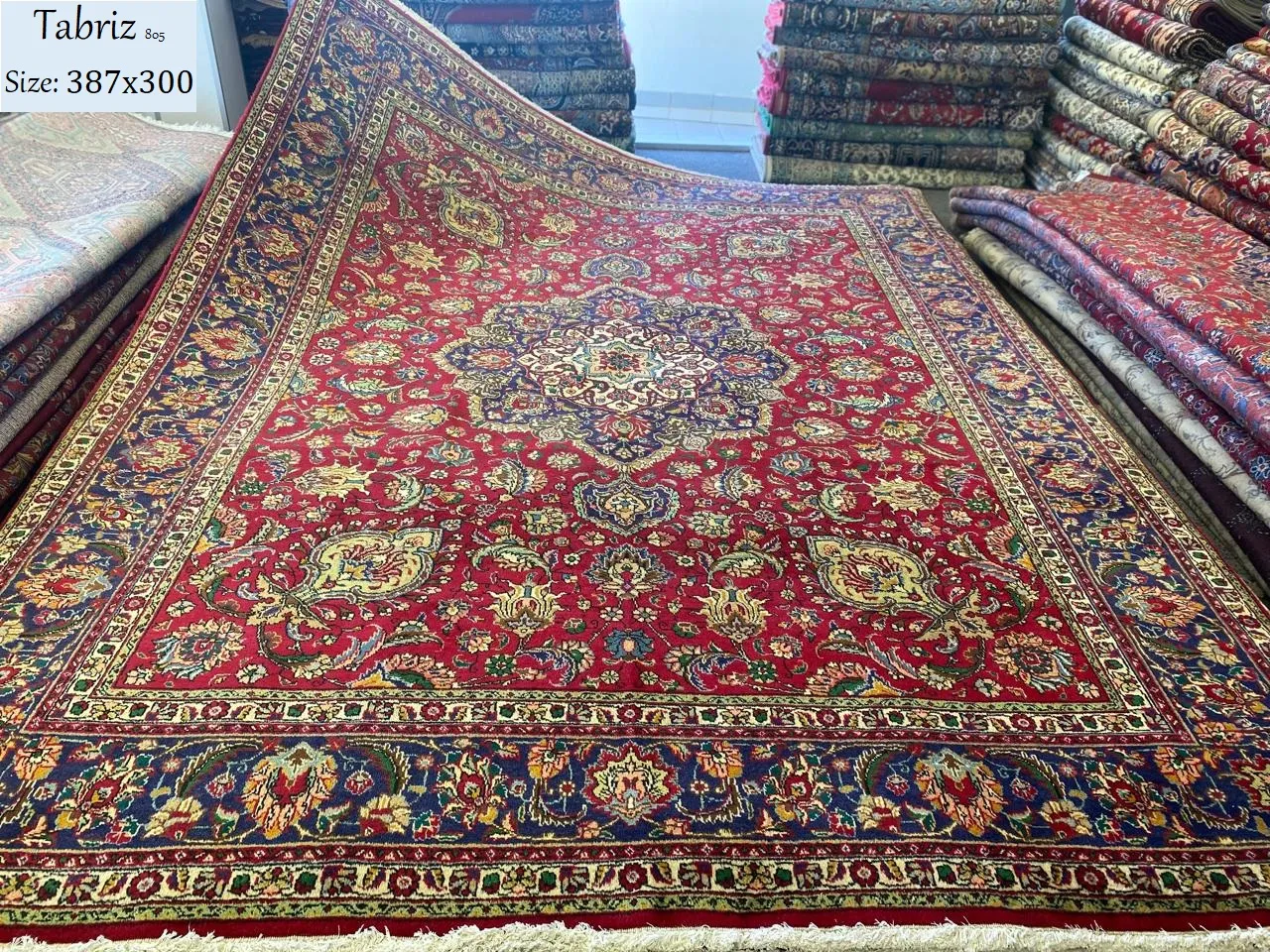 Handmade Tabriz rug, Size: 387 x 300 cm, fine knotted by natural wool & vegetable dye, R24 000 valuation certificate.