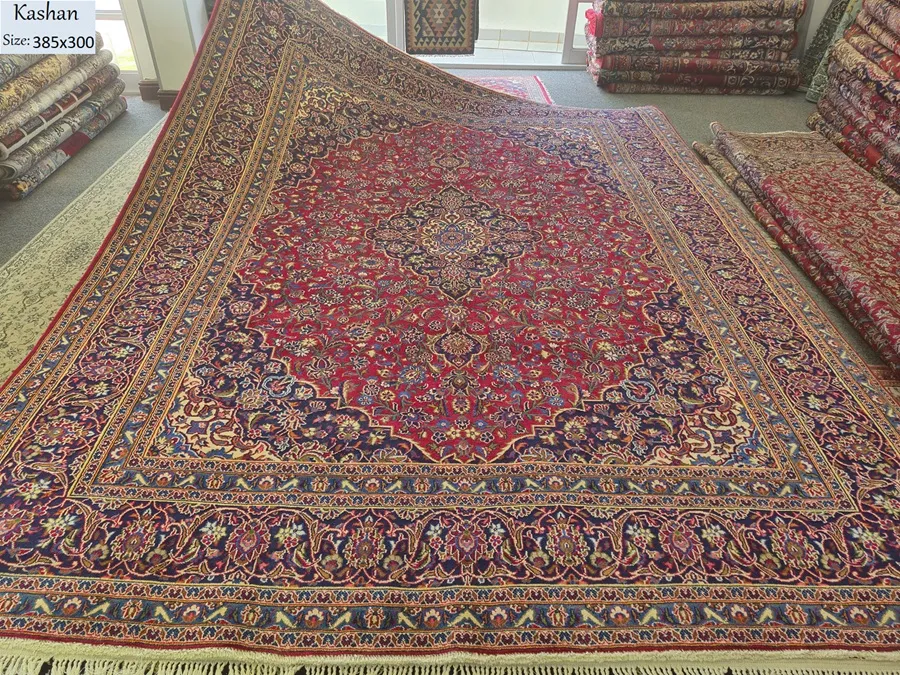 Persian handmade Kashan rug, Size 385 × 300 cm, hand knotted by natural wool & vegetable dye, R15 000 valuation certificate.