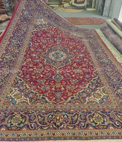 Pre-loved Hand-knotted Persian Kashan rug, Size: 300 x 200 cm, natural wool & vegetable dye, R12 000 valuation certificate.