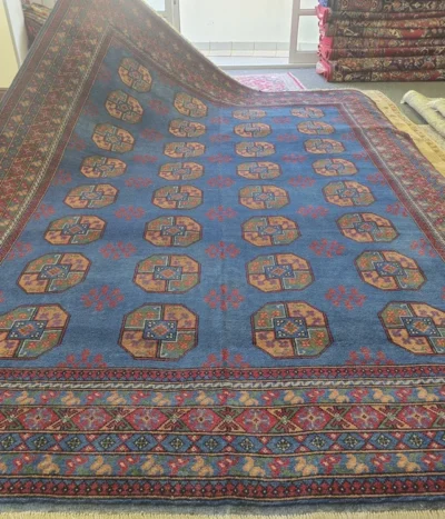 Premium Hand-Knotted Bokhara rug, Size: 343 x 244 cm, featuring the iconic "Tekke Gul" design(Elephant Foot) motif, Crafted from premium wool with a lustrous finish.