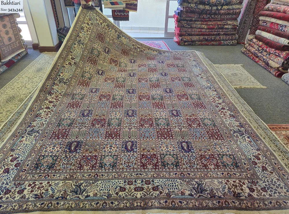 Premium Hand-knotted Bakhtiari Persian wool and silk rug with the iconic Khesti (garden panel) design, Size: 343 x 244 cm.