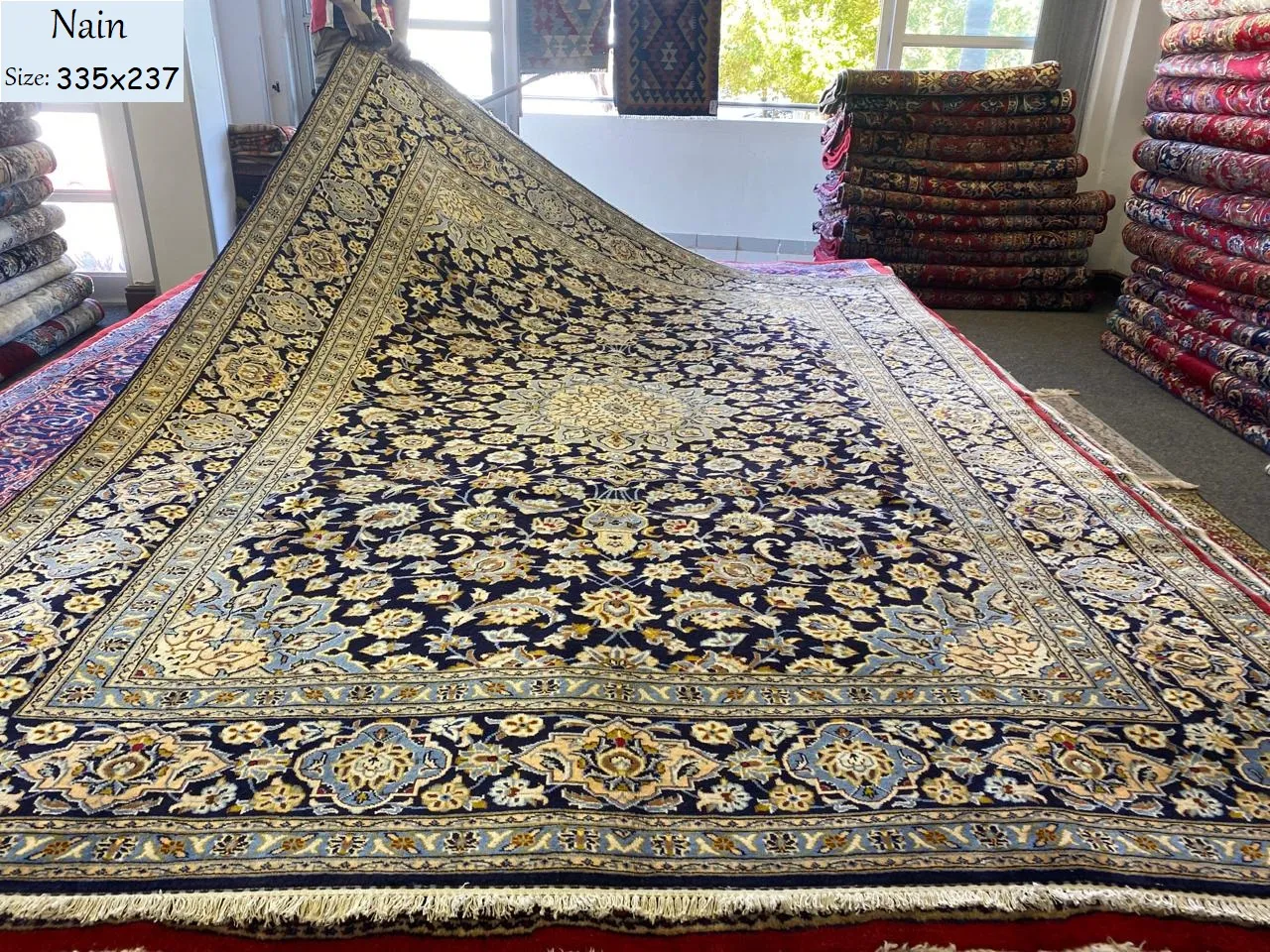 Premium Nain carpet, Size: 335 x 237 cm, golden navy color, fine hand knotted by natural wool & vegetable dye, R40 000 valuation certificate & exchange warranty. Imported from Iran.