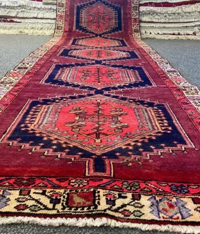 Handmade Shiraz hallway runner, Size: 325 x 108 cm, natural wool & vegetable dye, imported from Iran. Valuation Certificate: R10 000