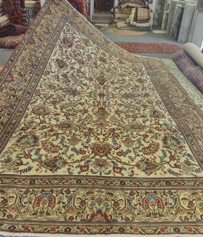 Vintage hand-knotted Royal Tabriz rug, Size: 315 x 210 cm, vines, blossoms all-over floral design, cream/ivory background with reds, blues, and subtle greens.