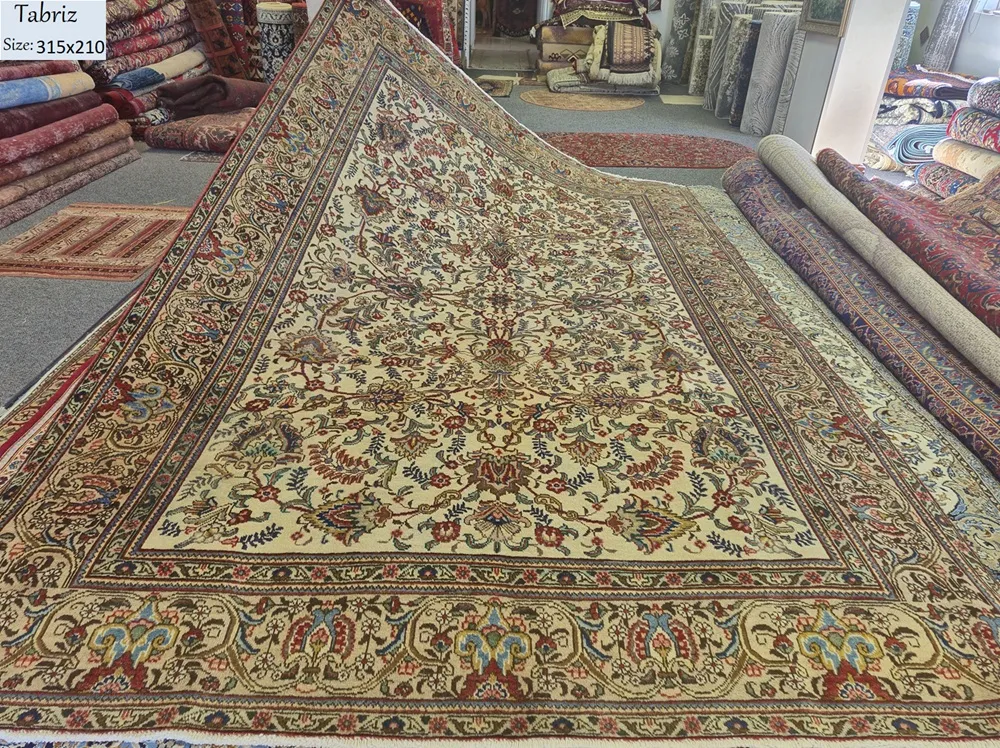 Vintage hand-knotted Royal Tabriz rug, Size: 315 x 210 cm, vines, blossoms all-over floral design, cream/ivory background with reds, blues, and subtle greens.