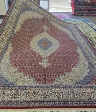 Fine Tabriz carpet, Size: 300 x 200 cm, Mahi pattern, 700 knots wool on cotton quality, R15 000 valuation certificate.