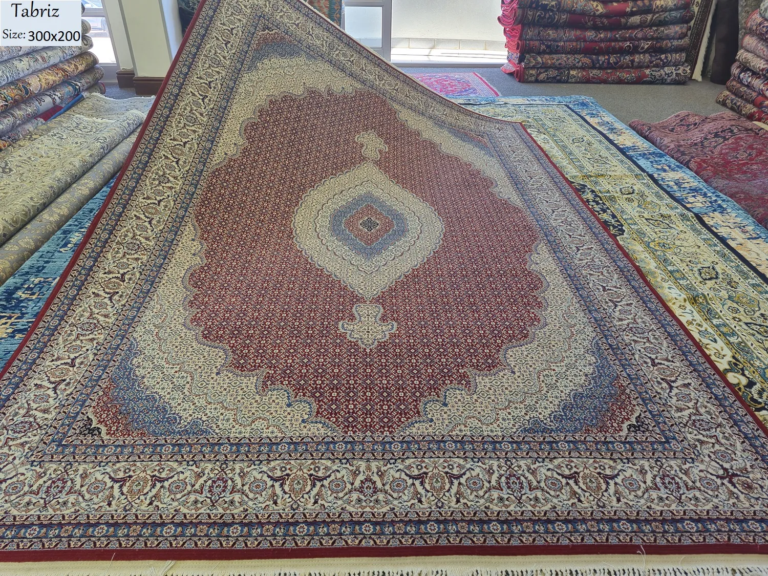 Fine Tabriz carpet, Size: 300 x 200 cm, Mahi pattern, 700 knots wool on cotton quality, R15 000 valuation certificate.