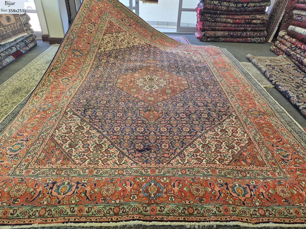 Heritage Hand-Knotted Bijar Rug, Size: 358 x 253 cm, Rust Red, Midnight Blue, Sage Green, classic geometric diamond medallion and "Herati" (fish) patterns, framed by a vibrant, multi-layered border.