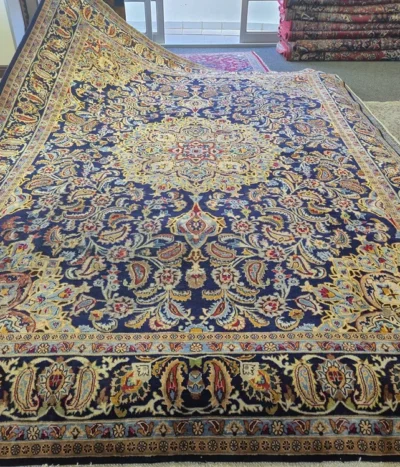 Vintage Hand-Knotted Isfahan Rug, Size: 383 x 283 cm, Royal Blue-cream and gold central medallion, surrounded by an intricate dance of scrolling floral vines and classic paisley motifs.