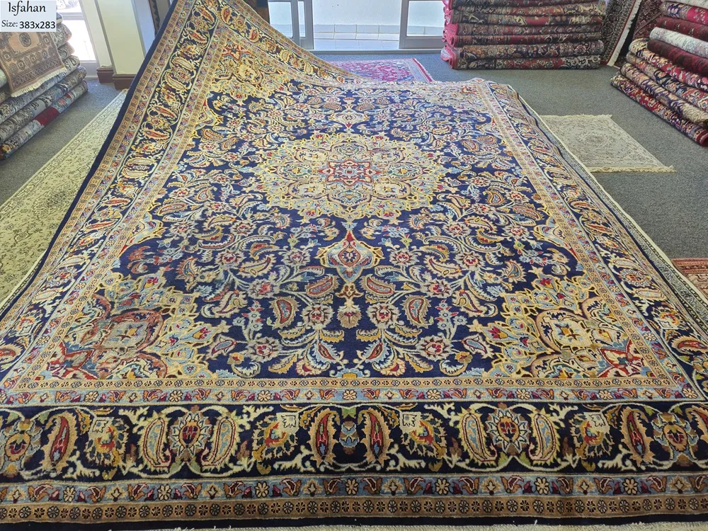Vintage Hand-Knotted Isfahan Rug, Size: 383 x 283 cm, Royal Blue-cream and gold central medallion, surrounded by an intricate dance of scrolling floral vines and classic paisley motifs.