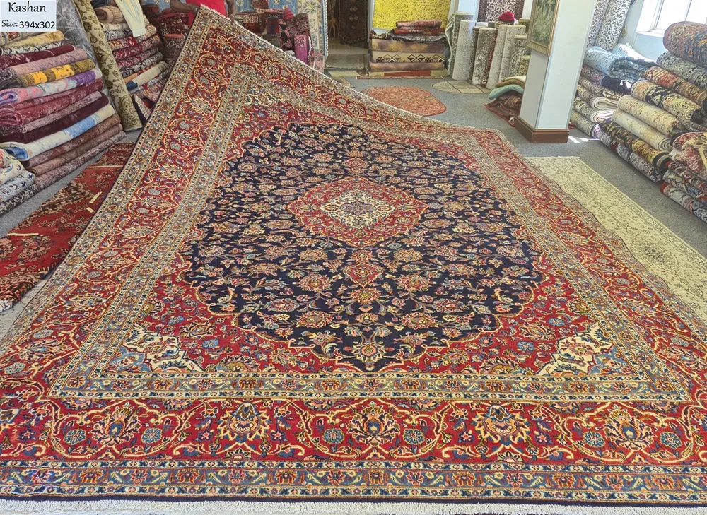 Persian handmade Kashan carpet, Size 394x302 cm, Navy, fine knotted by natural wool & vegetable dye, R24 000 valuation certificate.