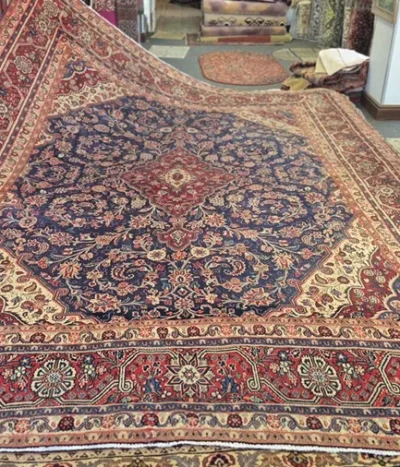 Navy Kashan rug, Size: 374 x 271 cm, Hand knotted by natural wool & vegetable dye, R30 000 valuation.