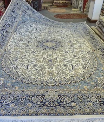 Persian Isfahan rug, Size: 400 × 300 cm, light color, 500 knots per square, wool on cotton, R15 000 valuation certificate.