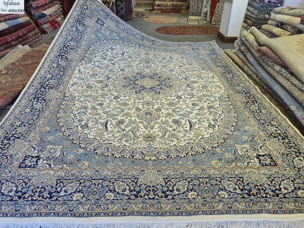 Persian Isfahan rug, Size: 400 × 300 cm, light color, 500 knots per square, wool on cotton, R15 000 valuation certificate.