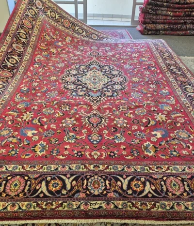 Pre loved antique Isfahan carpet, Size: 395 × 296 cm, hand knotted artist signature by natural wool & vegetable dye, R18 000 valuation certificate.