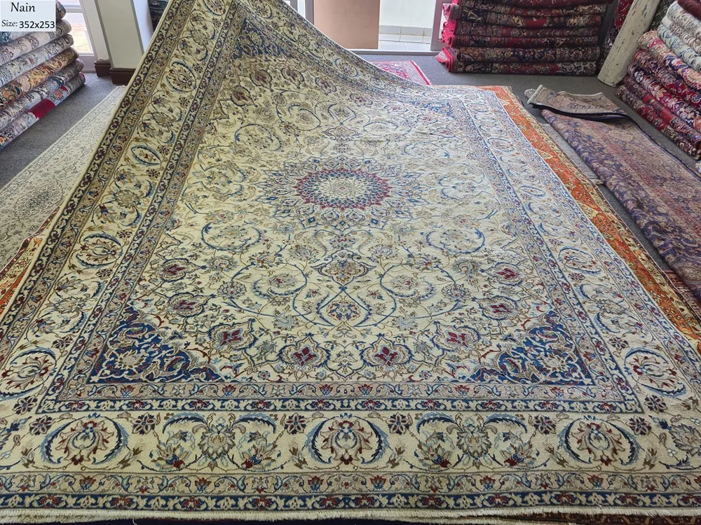 Pre loved handmade Nain rug, Size: 352 x 253 cm, natural wool & vegetable dye, R28 000 valuation certificate & exchange warranty. Imported from Iran.