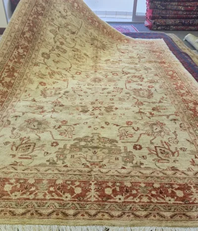 Elegant Premium Chobi rug, Size: 300 x 204 cm, muted cream base and delicate floral patterns. Very fine hand-knotted with traditional techniques.
