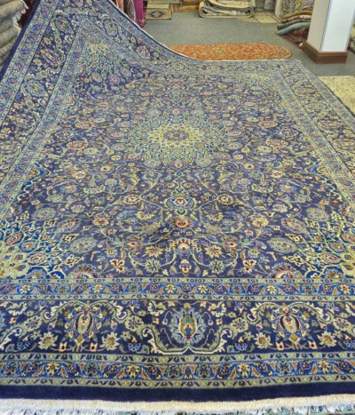 Experience the pinnacle of Persian artistry with this Hand-Knotted Nain Blue Medallion Rug. Size: 395x290 cm, fine knotted by natural wool. R50 000 valuation certificate.