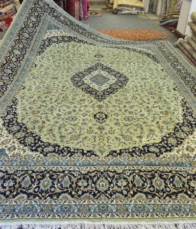 Sage Kashan rug, Size: 400 x 300 cm, 400 knots wool on cotton quality, R14 000 valuation certificate.