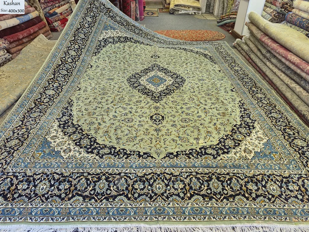 Sage Kashan rug, Size: 400 x 300 cm, 400 knots wool on cotton quality, R14 000 valuation certificate.