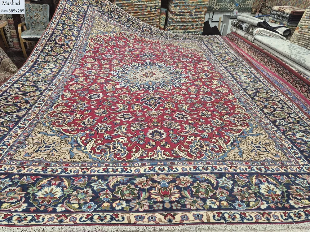 Second-hand Mashad rug, Size: 385x285 cm, Hand knotted by natural wool & vegetable dye. R16 000 valuation certificate & exchange warranty.