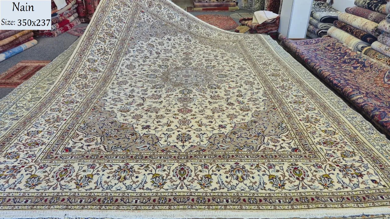 Second hand Nain rug, Size: 350 x 237 cm, Hand knotted, 100% wool, R22 000 valuation.
