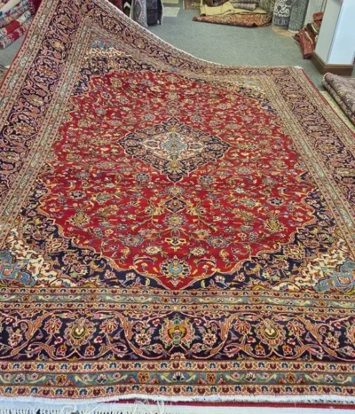 Second hand Persian Kashan rug, Size 385 x 290 cm, hand knotted by natural wool & vegetable dye, R14 000 valuation certificate.