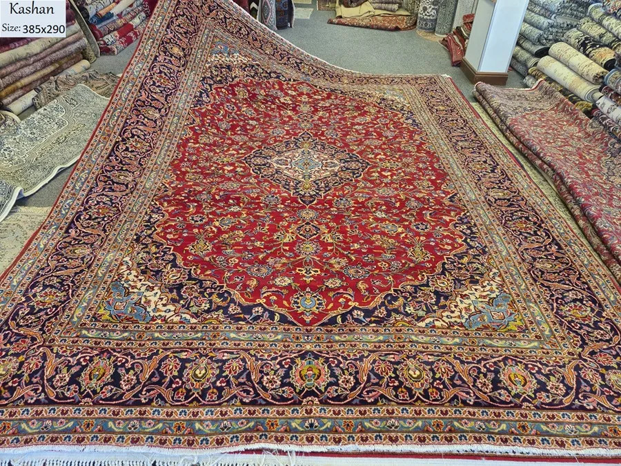 Second hand Persian Kashan rug, Size 385 x 290 cm, hand knotted by natural wool & vegetable dye, R14 000 valuation certificate.