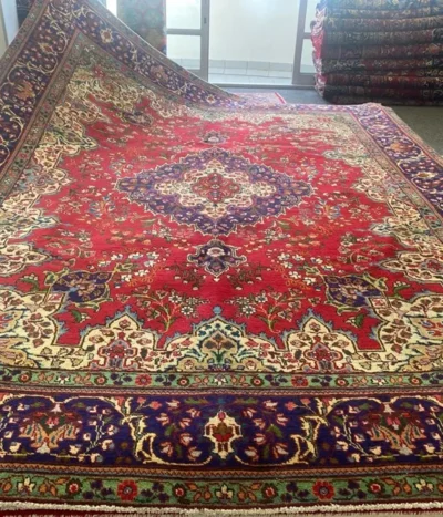 Second hand Tabriz rug, Size 390 x 300 cm, hand knotted by natural wool & vegetable dye, R16000 valuation certificate.