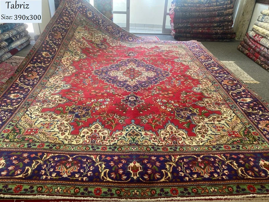 Second hand Tabriz rug, Size 390 x 300 cm, hand knotted by natural wool & vegetable dye, R16000 valuation certificate.