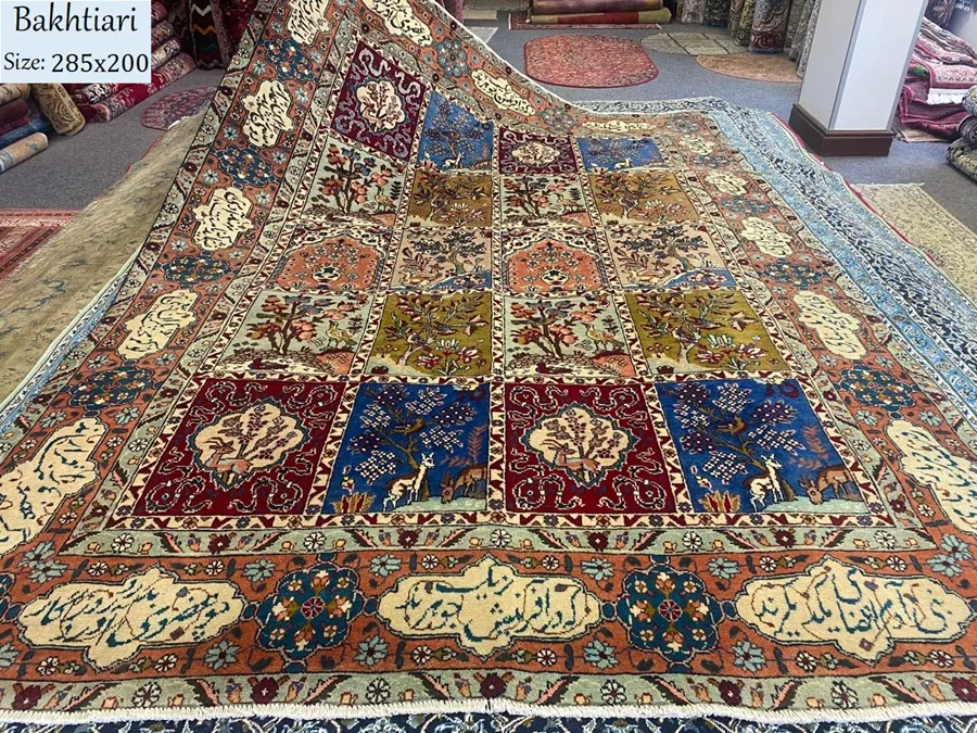 Masterpiece Bakhtiari rug, Size: 285x200 cm, silk on wool, showcases the intricate calligraphy of Saadi's renowned poem "Bani Adam," reflecting the profound wisdom and universal message of human interconnectedness.