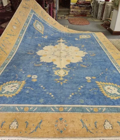 Vintage Isfahan carpet, Size: 398 x 281 cm, faded genuine hand knotted vintage Persian rug, R40 000 valuation.