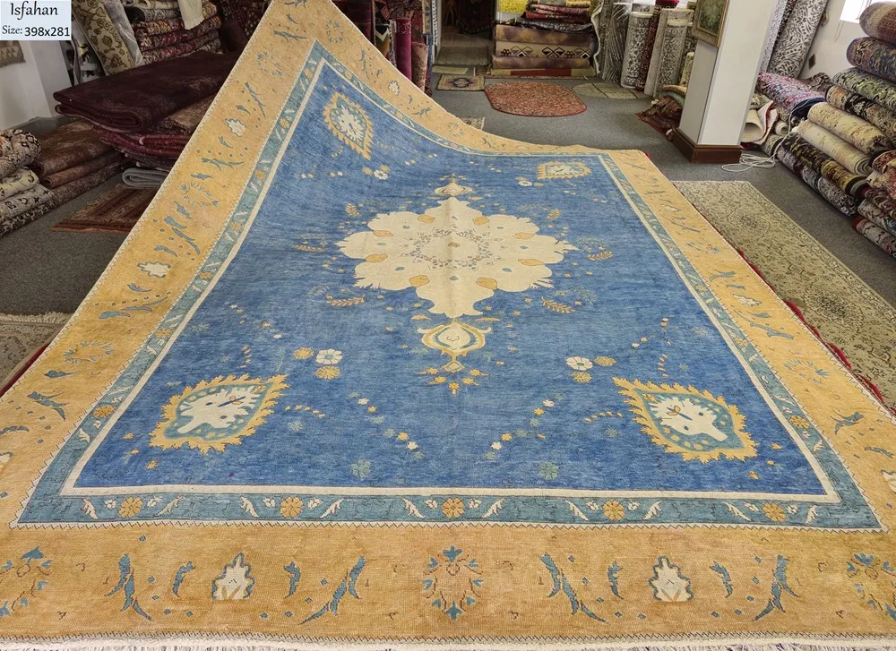 Vintage Isfahan carpet, Size: 398 x 281 cm, faded genuine hand knotted vintage Persian rug, R40 000 valuation.