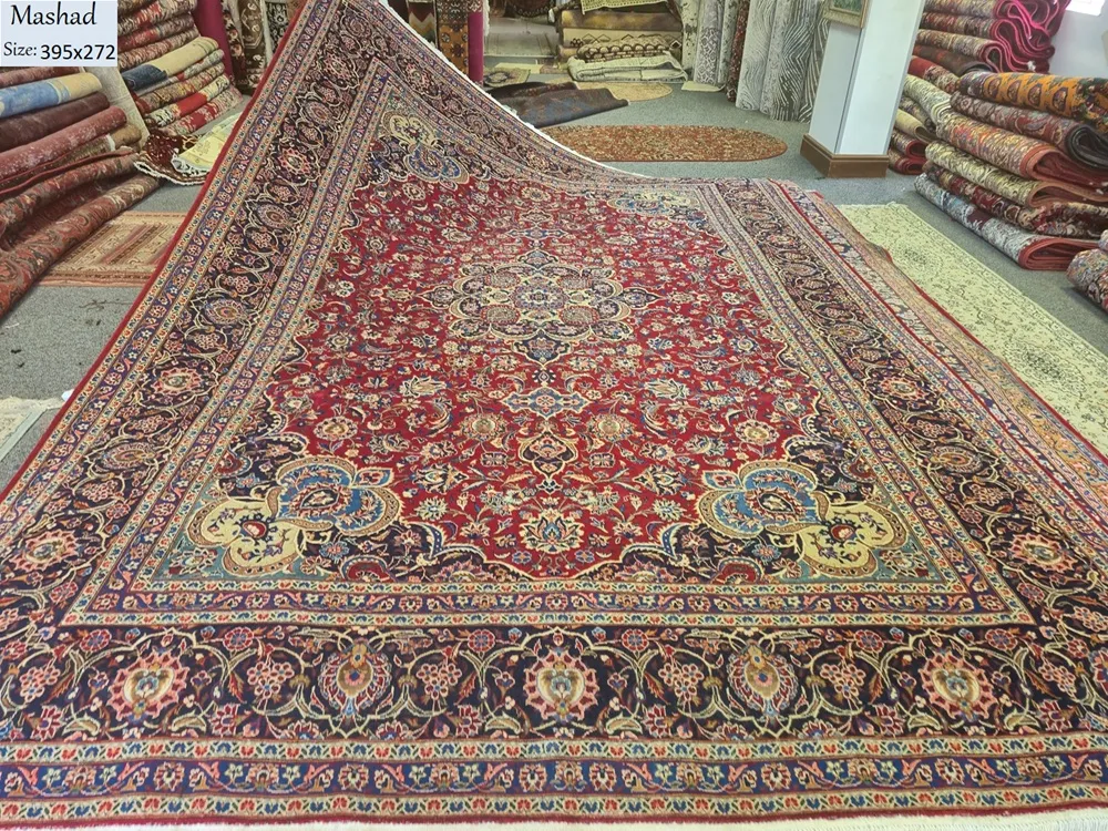 Antique hand-knotted Mashhad Persian carpet, Size: 395 x 272 cm, Lachak Toranj design, Artist signature on the carpet, craftsmanship of Khorasan weaving,excellent condition.