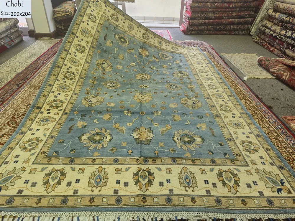 Hand-knotted Chobi Ziegler rug, Size: 299 x 204 cm, Floral Arabesque sky-blue field with ivory accented, natural wool & vegetable dyes.