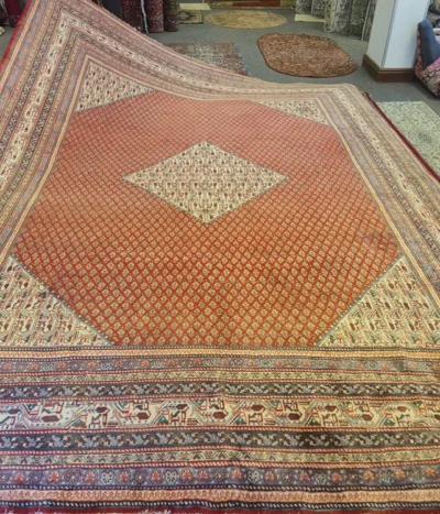 Hand-Knotted Bijar antique Persian rug, Size: 398 x 305 cm, diamond-shaped central medallion with Herati pattern, rust navy blue & ivory, High-quality wool on a cotton foundation.