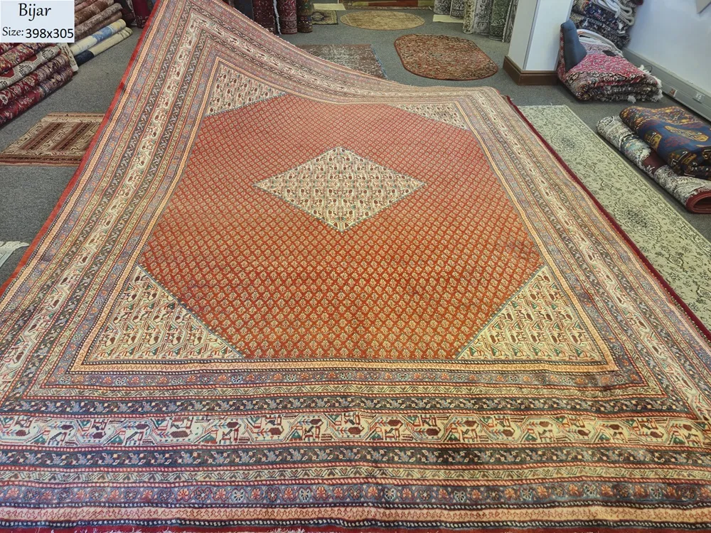 Hand-Knotted Bijar antique Persian rug, Size: 398 x 305 cm, diamond-shaped central medallion with Herati pattern, rust navy blue & ivory, High-quality wool on a cotton foundation.
