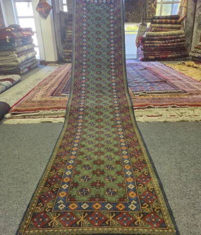 Hand-knotted Afghan Hallway runner, Size: 377 x 84 cm, sage-to-forest green field, featuring traditional tribal patterns, 100% Hand-Spun Wool on Cotton Warp.
