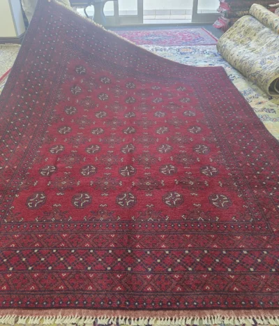 Handmade Afghan Bokhara, Size: 238 x 173 cm,  deep madder red, 100% High-quality wool pile, Primarily natural vegetable dyes.