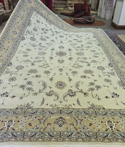 Nain carpet, Size: 350 x 250 cm, curvilinear floral patterns, ivory/cream field with soft blue, beige, 400 knots wool on cotton quality.
