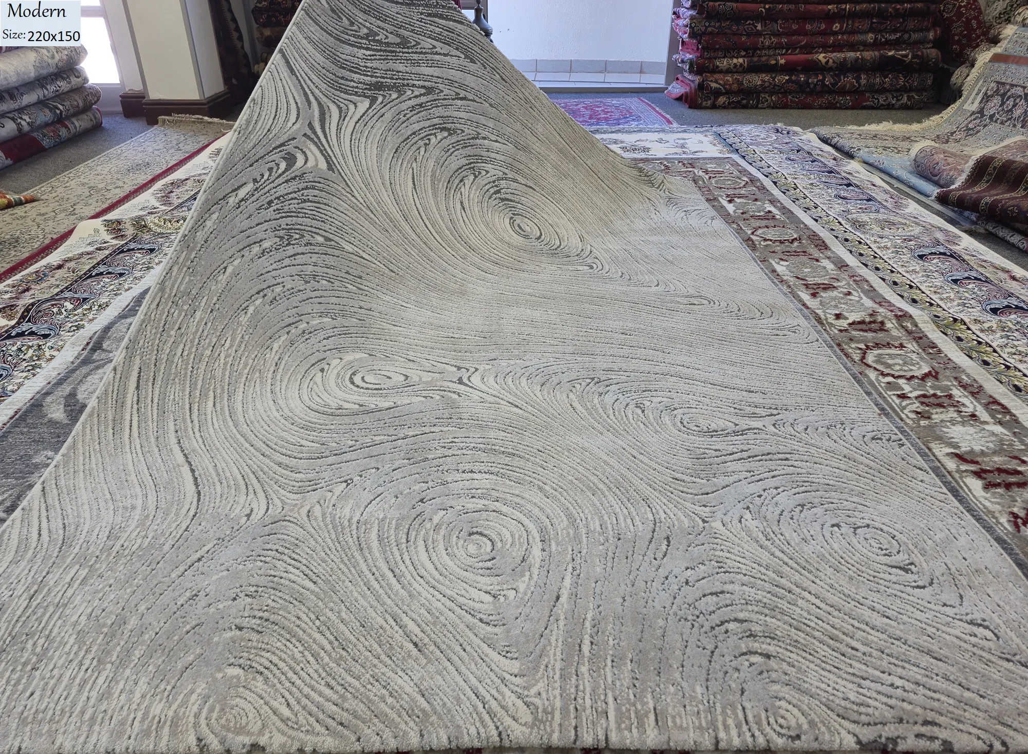 Turkish Modern contemporary carpet, Size: 220 x 150 cm, silver swirl design, Polyester, Machine made.