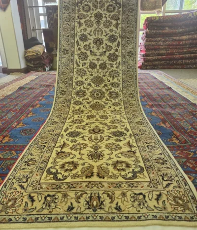 Very fine hand-knotted Nain runner, Size: 233 x 78 cm, sophisticated ivory field adorned with intricate floral palmettes and curvilinear vine-work.