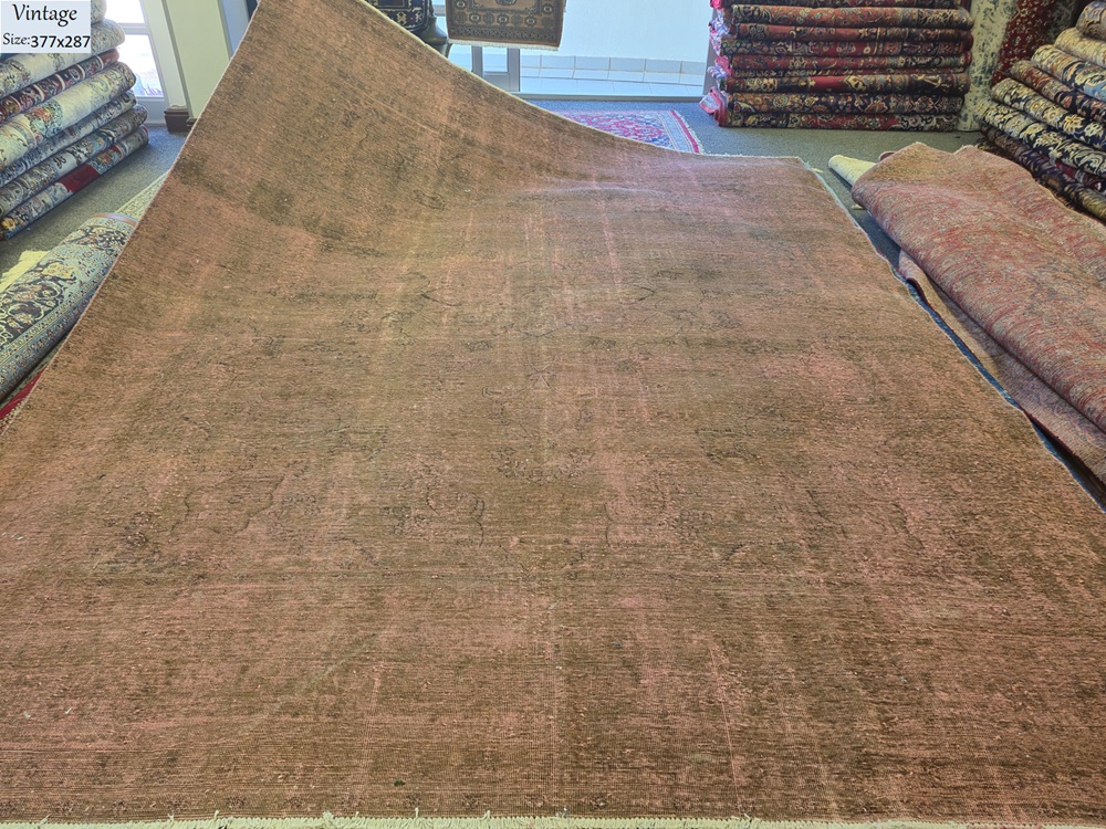 Vintage Distressed rug, Size: 377 x 287 cm, 100% Hand-Knotted Wool, fusion of antique soul and modern, Faded Rose, Terracotta, and Earthy Umber.