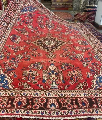 Antique Persian Hamedan carpet, Size: 285 × 193 cm, Hand knotted by natural wool & vegetable dye, R10 000 valuation.