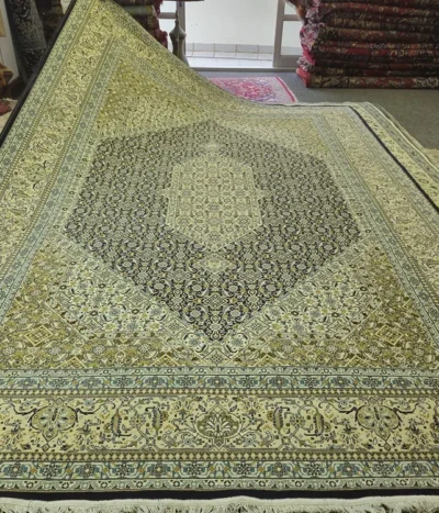 Bijar carpet Size: 350 x 250 cm, ivory, olive, and gold field, 500 knots wool on cotton quality, R15 000 valuation certificate.